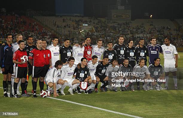 Teams pose before the friendly match between Real Madrid and Palestinian & Israeli XI at the Ramat Gan stadium on June 19, 2007 in Tel Aviv, Israel