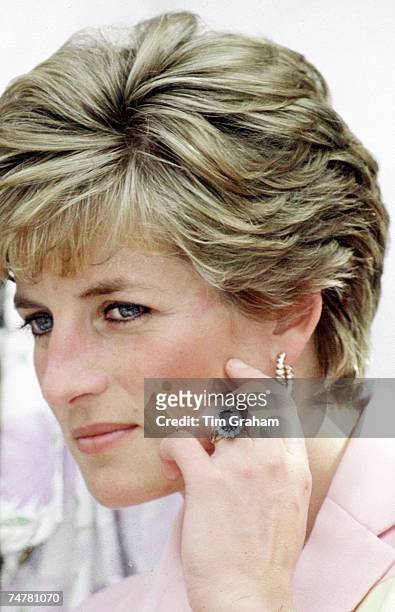 Diana, Princess of Wales' engagement ring, wedding ring, watch and gold earrings