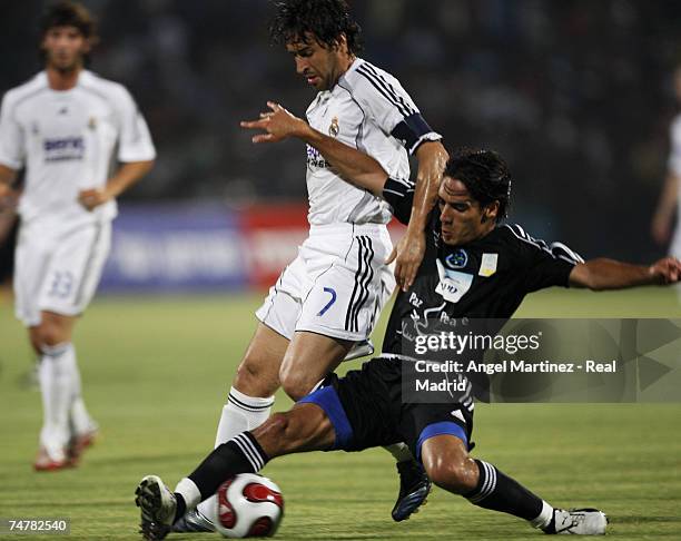 Israel Raul Gonzalez of Real Madrid vies with Yoav Ziv of the Peace Team during the friendly match between Real Madrid and Palestinian & Israeli XI...