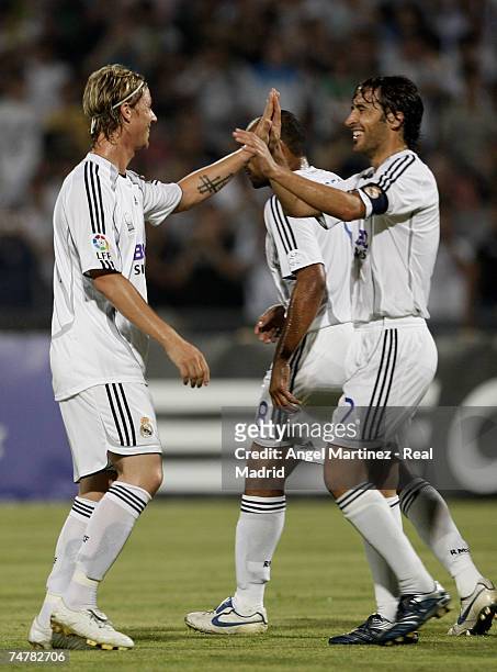 Guti and Raul Gonzalez of Real Madrid celebrate a goal during the friendly match between Real Madrid and a Palestinian & Israeli XI at the Ramat Gan...