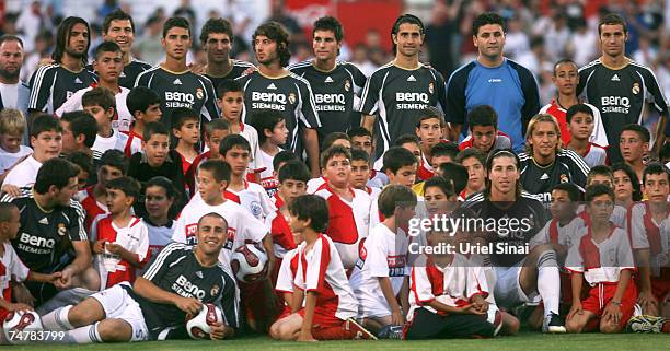 Real Madrid players pose with Israeli and Palestinian children before the match between Real Madrid and a Palestinian & Israeli XI at the Ramat Gan...