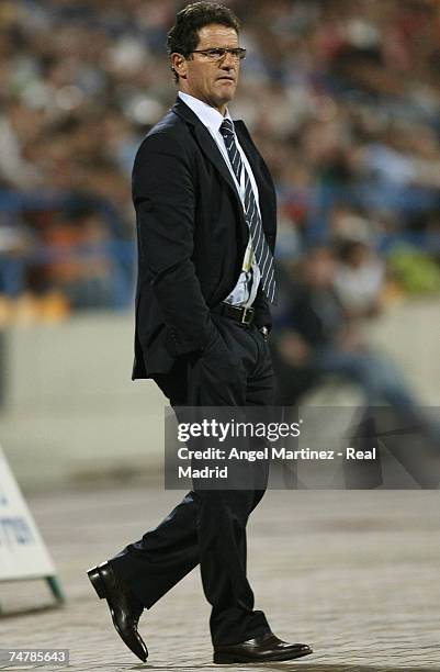 Real Madrid coach Fabio Capello looks on during the friendly match between Real Madrid and a Palestinian & Israeli XI at the Ramat Gan stadium on...