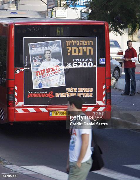 An advertisement on a Tel Aviv bus promotes the friendly match between Real Madrid and a Palestinian & Israeli XI at the Ramat Gan stadium on June...