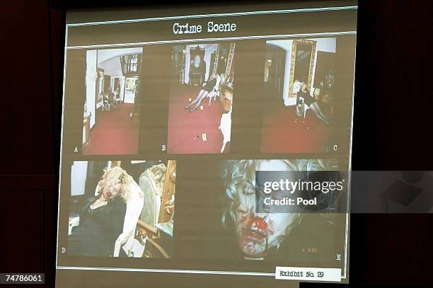 Projected crime scene photos are displayed of Lana Clarkson's body during the murder trial of music producer Phil Spector at the Los Angeles Superior...