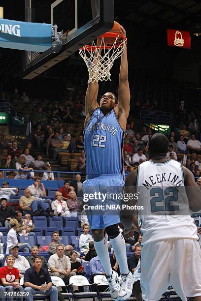 Chris Copeland of the Fort Worth Flyers dunks against Antonio Meeking of the Sioux Falls Skyforce during a D-League playoff game at the Arena on...