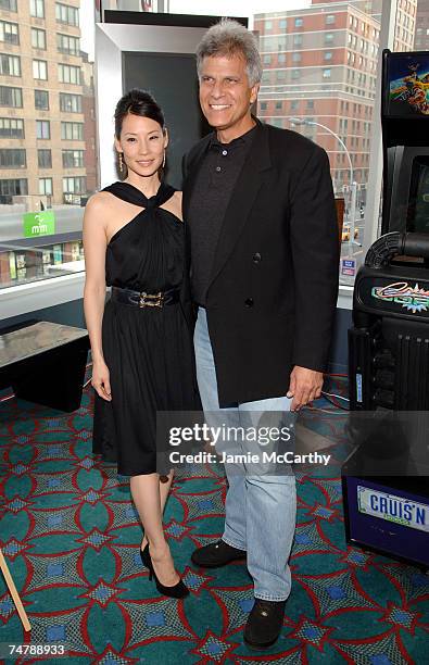 Lucy Liu, executive producer and Mark Spitz at the Tribeca Grand Hotel in New York City, New York