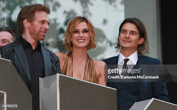 Jerry Bruckheimer, Keira Knightley and Orlando Bloom at the Odeon Leicester Square in London, United Kingdom.