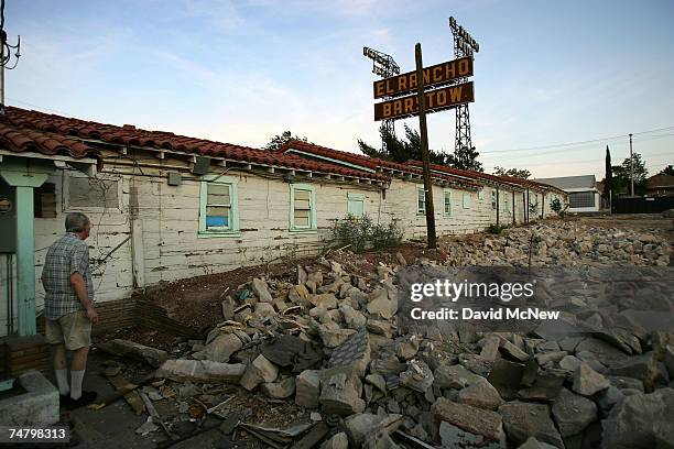 Pile of broken rubble is all that remains of a section of the El Rancho Motel, once a major Route 66 landmark, that burned in last summer?s arson...