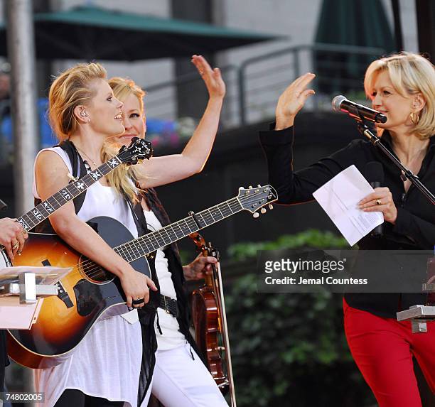 Natalie Maines and Martie Maguire of the Dixie Chicks with Diane Sawyer at the Bryant Park in New York City, New York