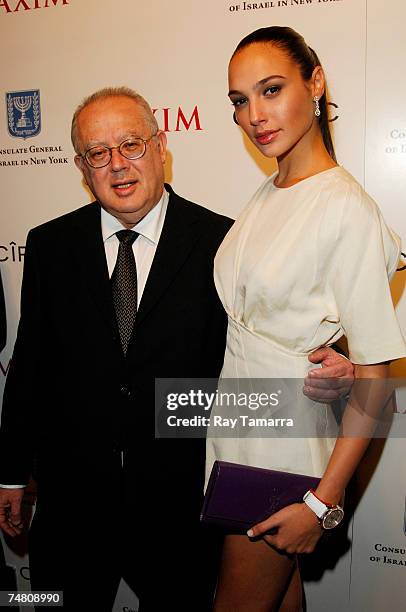 Ambassador Arye Mekel , Consul General of Israel in New York, and 2004 Miss Israel winner Gal Gadot attends Maxim's "Women of the Israeli Defense...