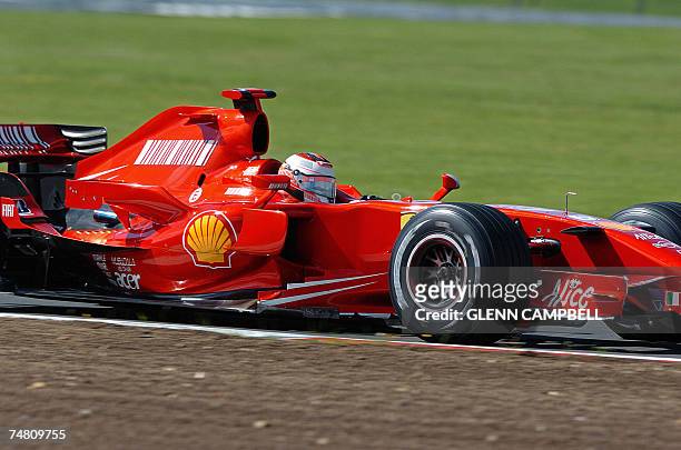 Silverstone, UNITED KINGDOM: Ferrari F1 driver Kimi Raikkonnen from Finland is pictured in action on a one day test programme in Silverstone, in...