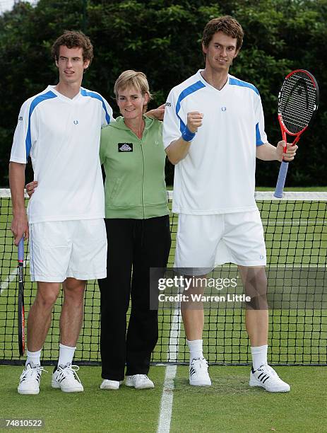 Judy Murray poses with her son Andy Murray of Scotland and his Madame Tussauds wax figure at The Boodles Challenge tennis tournament at The Stoke...