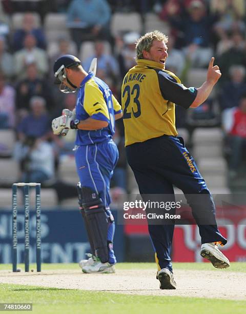 Shane Warne of Hampshire celebrates the wicket of Heath Streak of Warwickshire during the Friends Provident Trophy semi-final match between Hampshire...