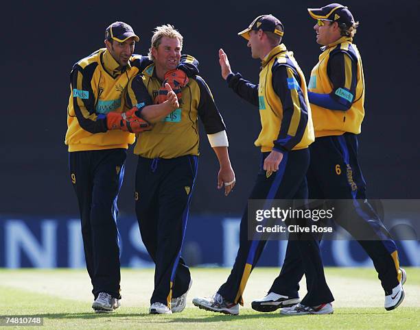 Shane Warne of Hampshire celebrates the wicket of James Troughton of Warwickshire during the Friends Provident Trophy semi-final match between...