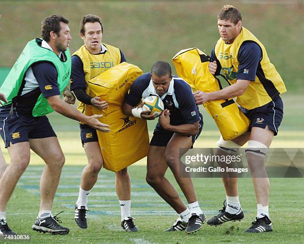 Derik Hougaard, JP Pietersen and Johann Muller in action during the South African Springbok training held at Northwood School on June 20, 2007 in...