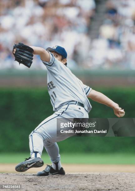 Hideo Nomo of Japan and pitcher for the Milwaukee Brewers winds up to throw a pitch during the Major League Baseball National League Central game...