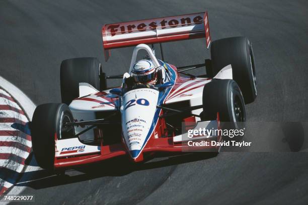 Scott Pruett of the United States drives the Firestone Patrick Racing Lola T96/00 Ford Cosworth during the Championship Auto Racing Teams 1996 PPG...