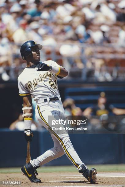 Barry Bonds of the Pittsburgh Pirates leans back and celebrates after hitting his 165th career home run during the Major League Baseball National...