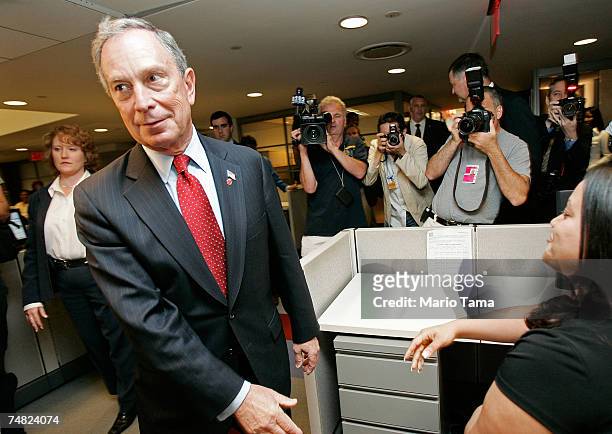 New York City Mayor Michael Bloomberg tours the 311 Customer Service Center after the city information hotline received its 50 000th call June 20,...
