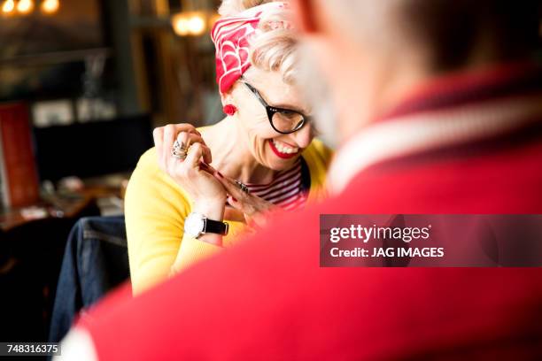 quirky couple relaxing in bar and restaurant, bournemouth, england - couple traveling stock pictures, royalty-free photos & images