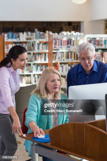 Person Using Computer At A Library Southwest Neighborhood Library Photos and Premium High Res Pictures ...