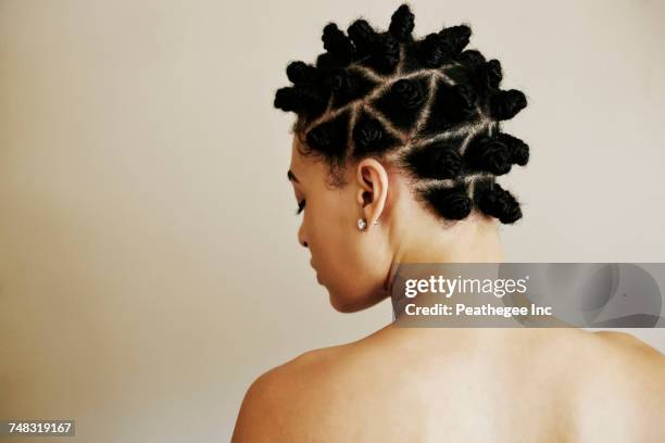 rear view of mixed race woman - african american women hair stock pictures, royalty-free photos & images