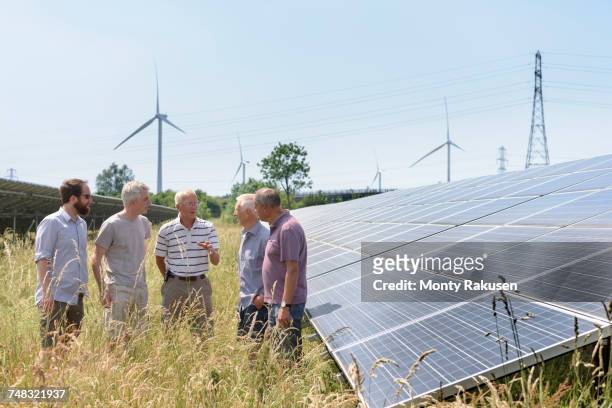 Local community members discussing their solar farm