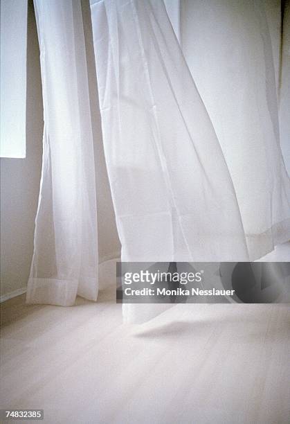 blowing white curtain - purity foto e immagini stock