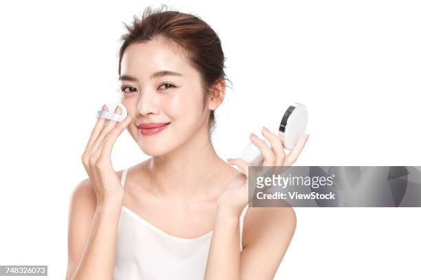 young woman makeup - powder puff stock pictures, royalty-free photos & images