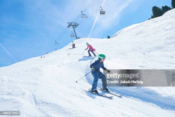 family on skiing holiday, hintertux, tirol, austria - austria stock pictures, royalty-free photos & images