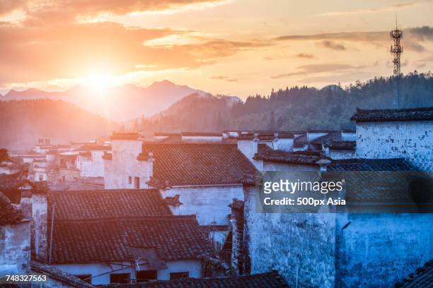 old village at sunset, xidi, anhui, china - anhui stock pictures, royalty-free photos & images