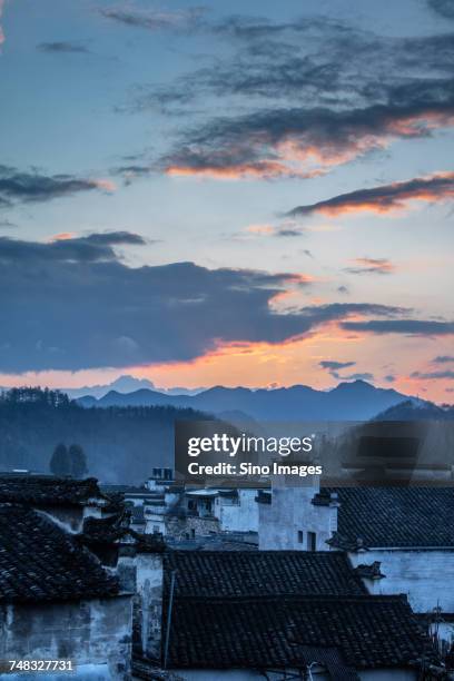 old village at sunset, xidi, anhui, china - anhui province photos et images de collection