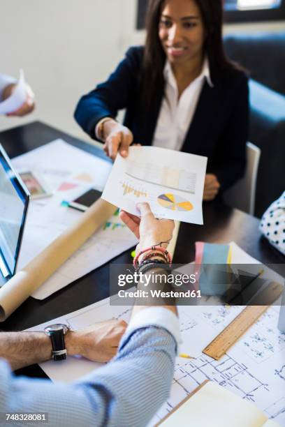Handoing Over 250 Woman Handing Over Paper Stock Photos, High-Res Pictures, and ...