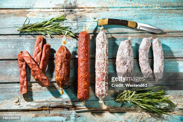 various sorts of salami and hard smoked sausages - salami 個照片及圖片檔