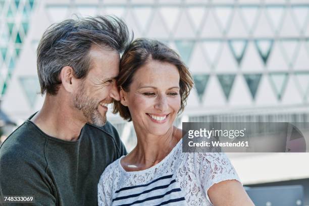 affectionate mature couple outdoors - 50 54 jahre stock-fotos und bilder