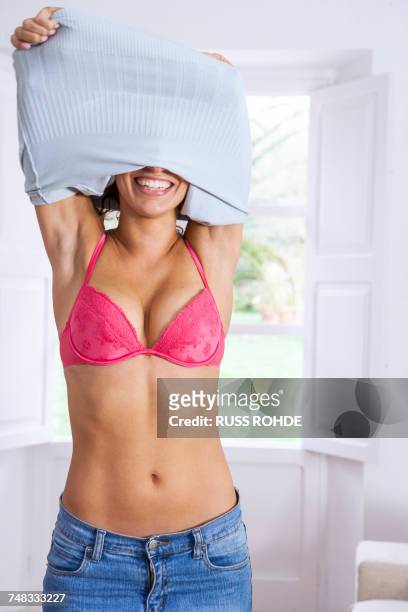 461 Taking Off Bras Stock Photos, High-Res Pictures, and Images