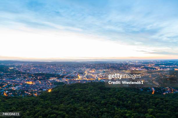 germany, lighted cityscape of stuttgart at twilight - stuttgart panorama stock pictures, royalty-free photos & images