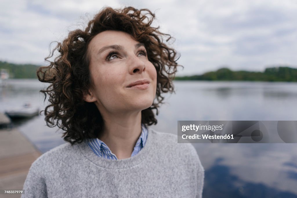 Portrait of woman looking in the sky