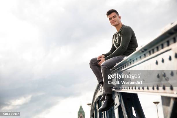 Man At Railing 7,248 Man Railing Portrait Stock Photos, High-Res Pictures, and Images ...