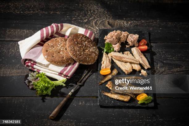 cold fish platter with tuna, sprats and sardines - sprat fish stock pictures, royalty-free photos & images