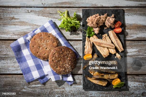 cold fish platter with tuna, sprats and sardines - sprat fish stock pictures, royalty-free photos & images