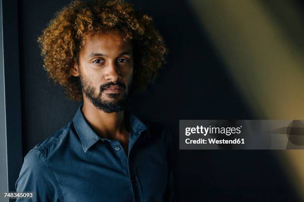 portrait of man with beard and curly hair - hair shadow stock pictures, royalty-free photos & images