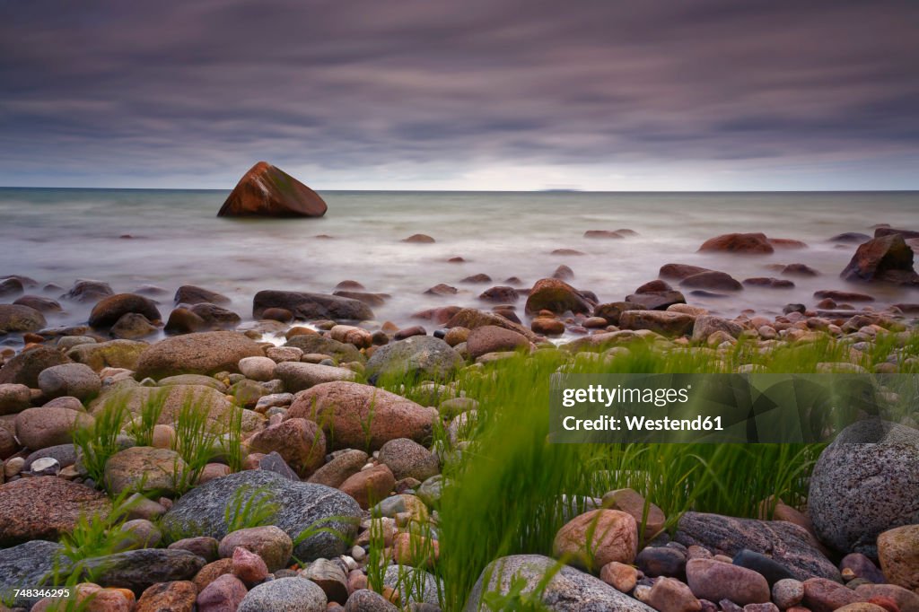 Germany, Mecklenburg-Western Pomerania, Jasmund National Park, Bolders and 'swanstone' at the Baltic Sea