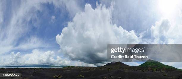 a mass of clouds above tavuvur volcano. - rabaul stock pictures, royalty-free photos & images