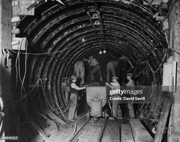 Construction workers under Bethnal Green, where they are building a new extension to the London Underground's Central Line from Liverpool Street,...