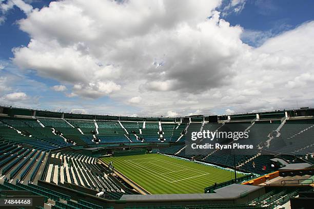 General view of a roofless Centre Court during previews for the Wimbledon Lawn Tennis Championships at the All England Lawn Tennis and Croquet Club...