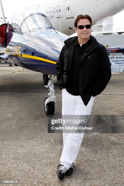 Hollywood actor and pilot John Travolta attends the 47th International Paris Air Show on June 21, 2007 in Le Bourget France. Travolta, invited by...