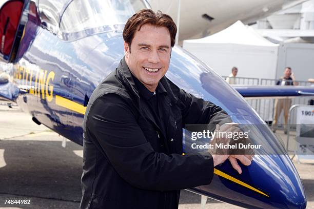 Hollywood actor and pilot John Travolta attends the 47th International Paris Air Show on June 21, 2007 in Le Bourget France. Travolta, invited by...