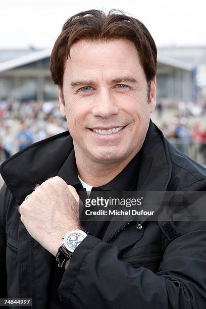 Hollywood actor and pilot John Travolta attends the 47th International Paris Air Show on June 21, 2007 in Le Bourget France. Travolta, invited by...