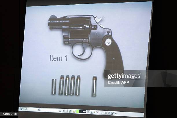 Los Angeles, UNITED STATES: A photograph showing the gun that killed Lana Clarkson with the rounds of ammunition recovered from the cylinder of the...